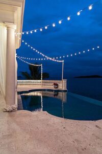 Festive bistro lighting decor for villa wedding in St. Thomas